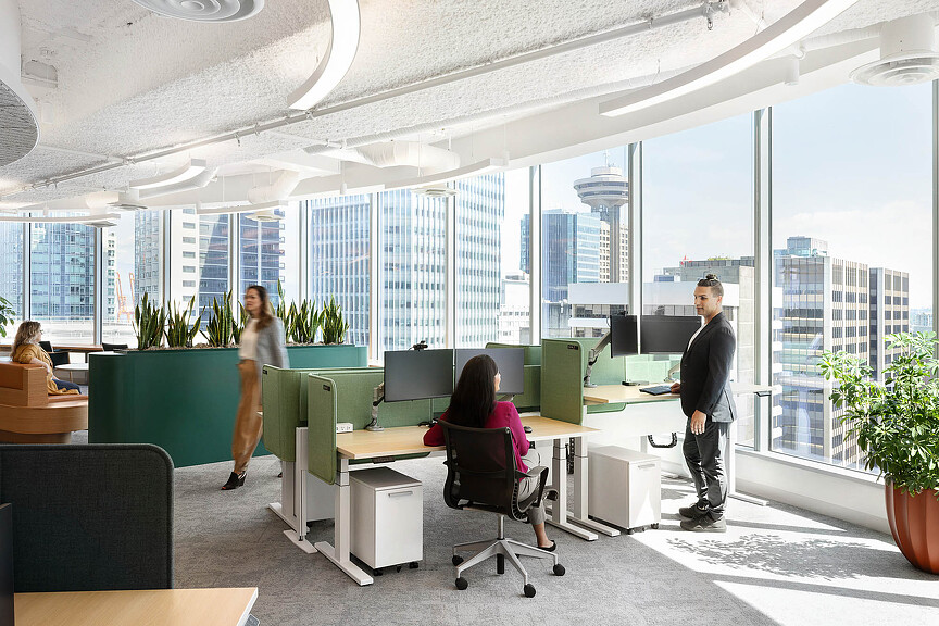 A group of people in an office.