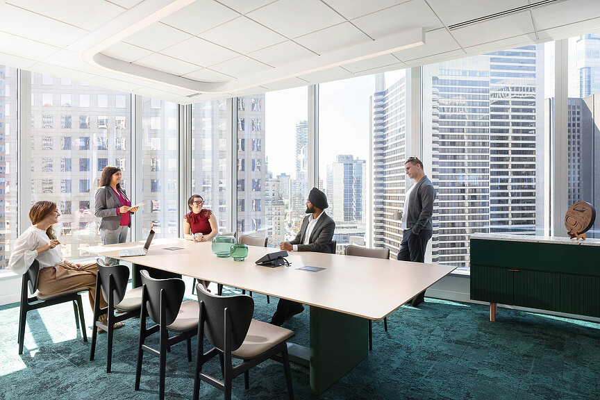 A group of people in a meeting.