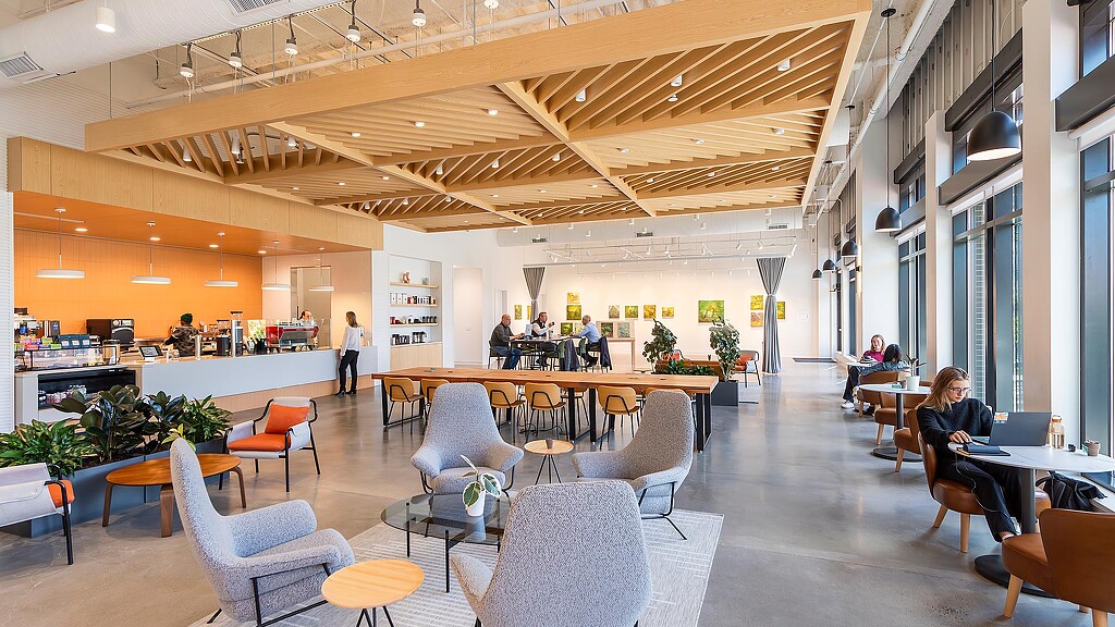 A room with tables and chairs.