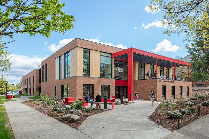 A building with people walking around.
