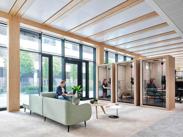 Synopsys Munich workplace with phone booths and large windows