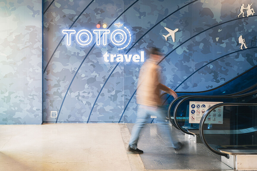 A person walking in a room.