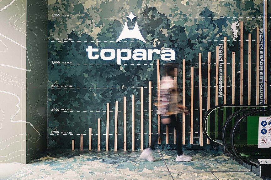 A person sitting on a bench.