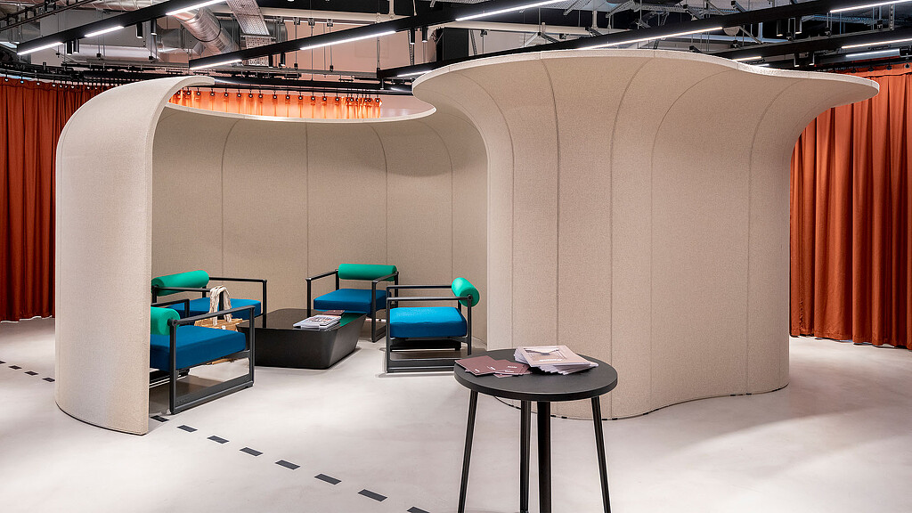 A room with chairs and a table.