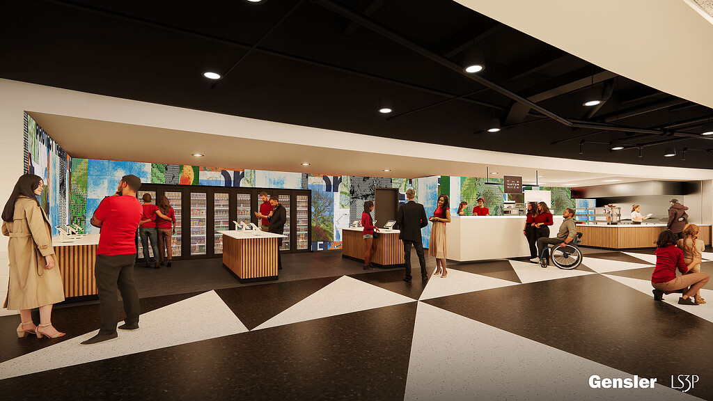 A group of people in a concession area of a stadium.