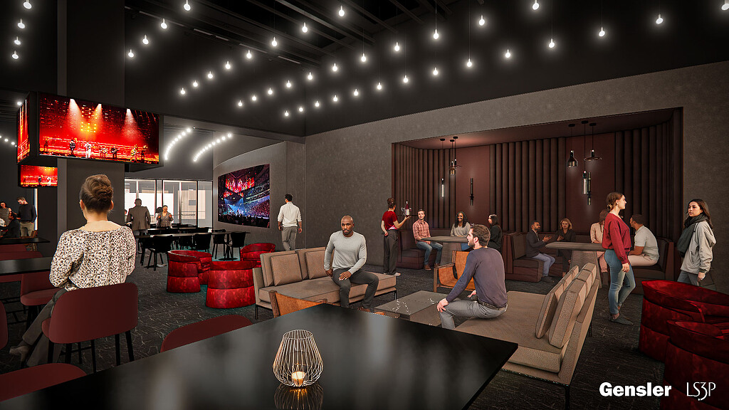 A group of people in a lounge room.