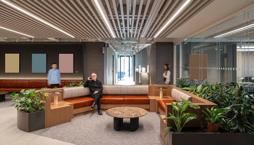 Financial services workplace with couches and round coffee table