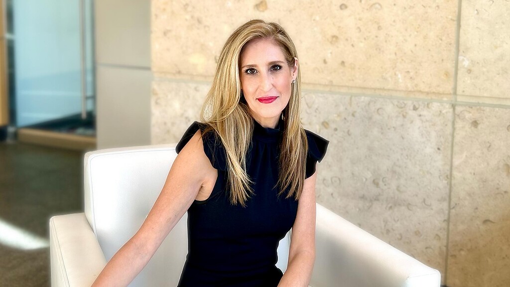 A woman in a black dress.