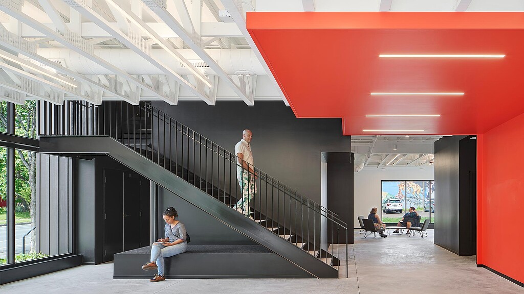 A person standing on a staircase.