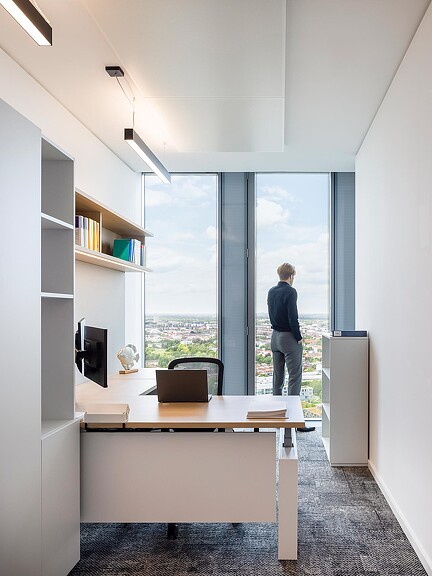 A person standing in a room.