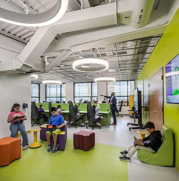 A group of people sitting in a room.