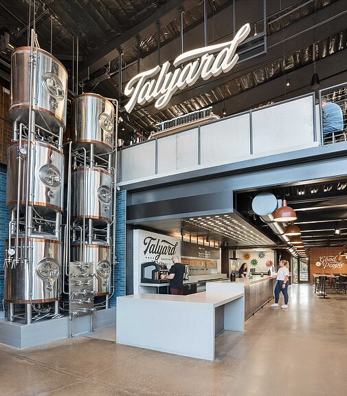 A large room with a large display of electronic devices.