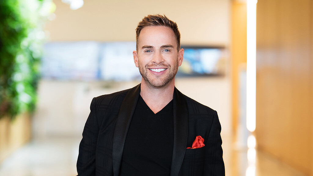 A man smiling for the camera.