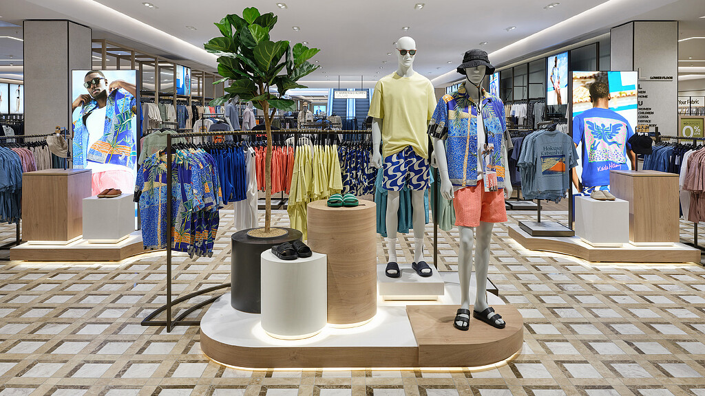 A group of mannequins in a store.