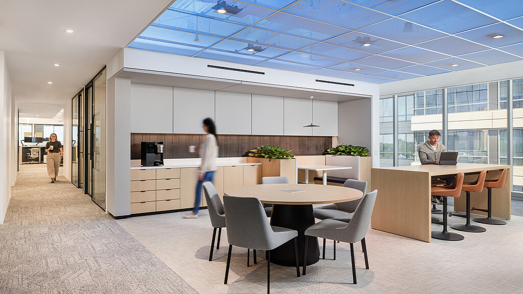 A few people in an office.