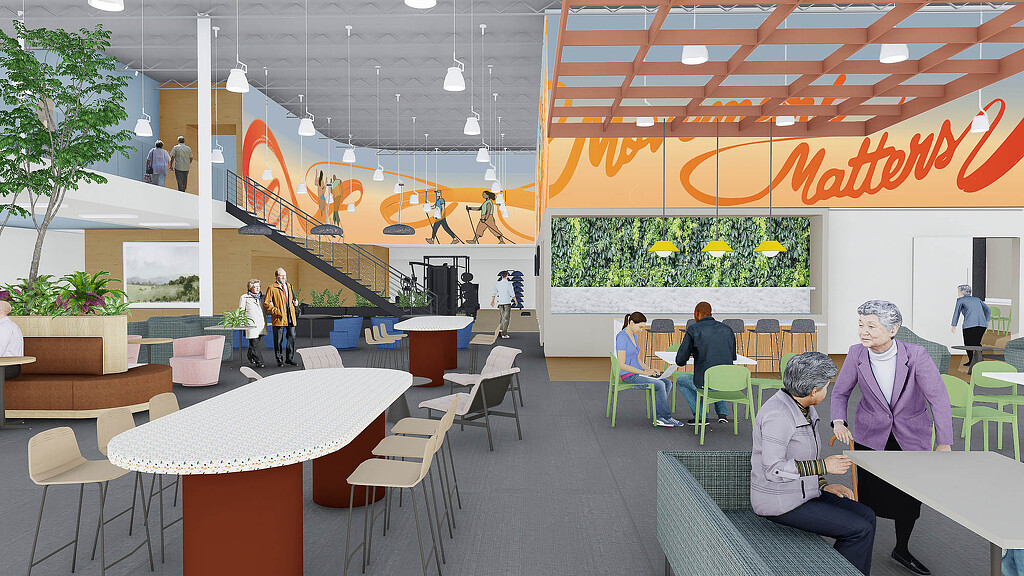 A group of people sitting at tables.