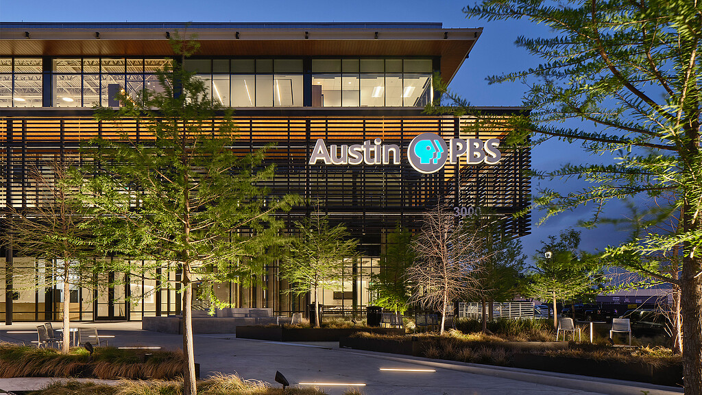 A building with trees in front of it.