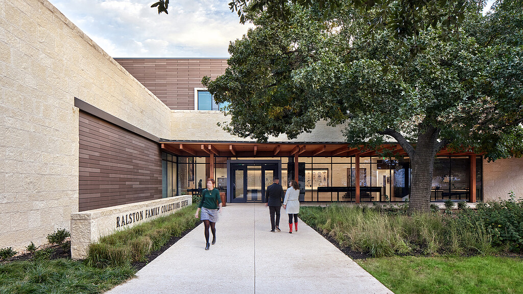 People walking outside a building.