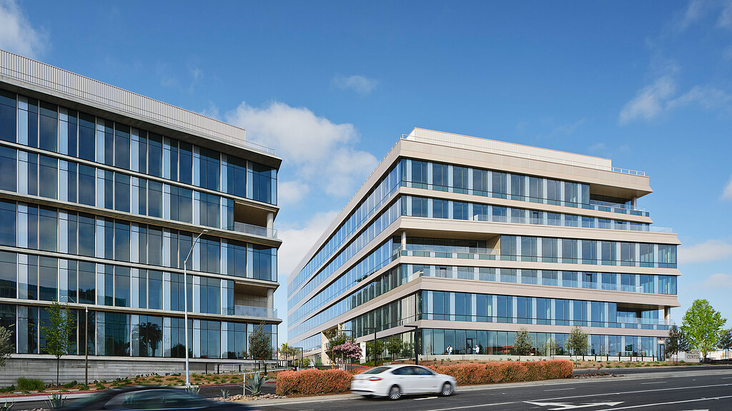 A building with a parking lot.