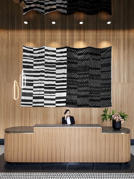 A person sitting at a desk.