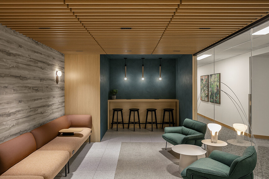 A room with a table chairs and a couch.