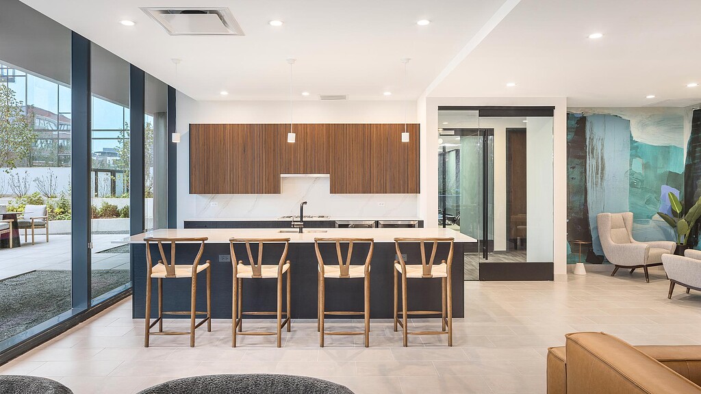 A room with a large table and chairs.