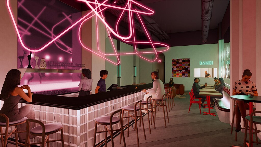 A group of people sitting at a bar.