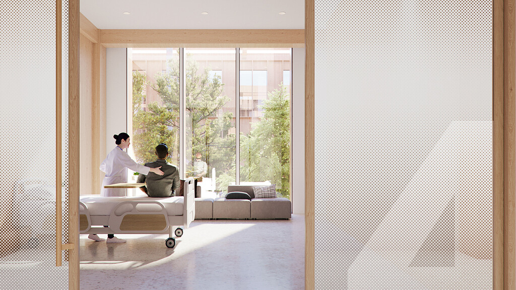 A man and a woman sitting in a room with a large window.