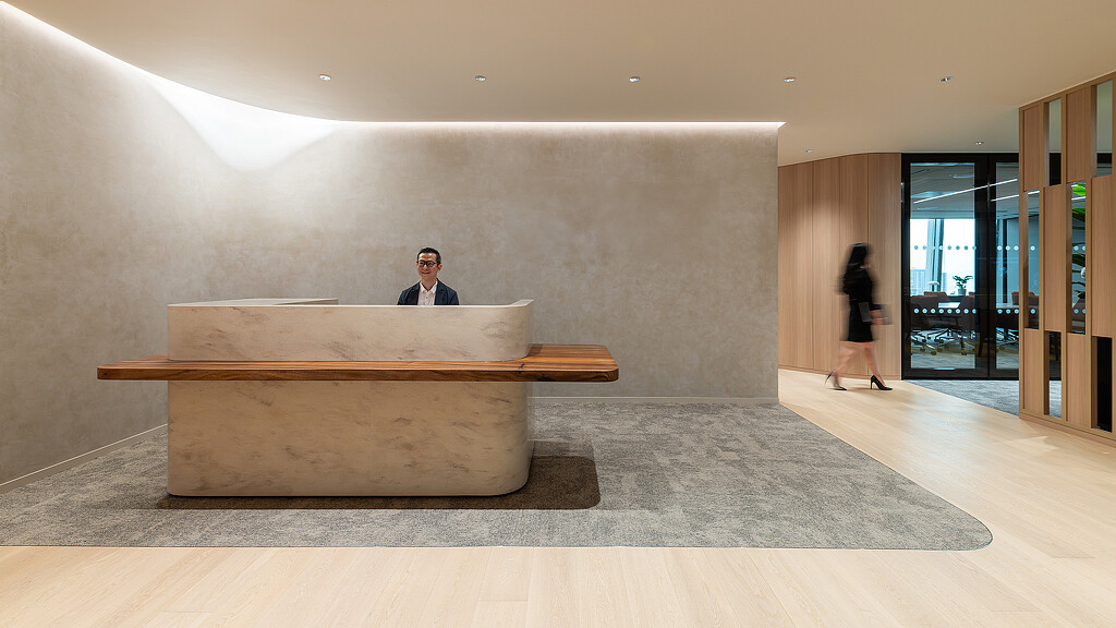 A person sitting on a bench.