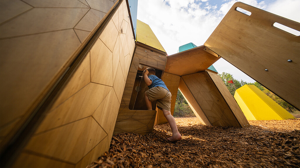 A person climbing a building.