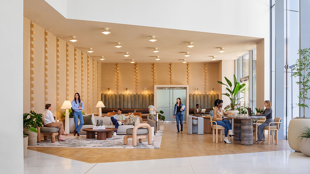 A group of people in a living room.