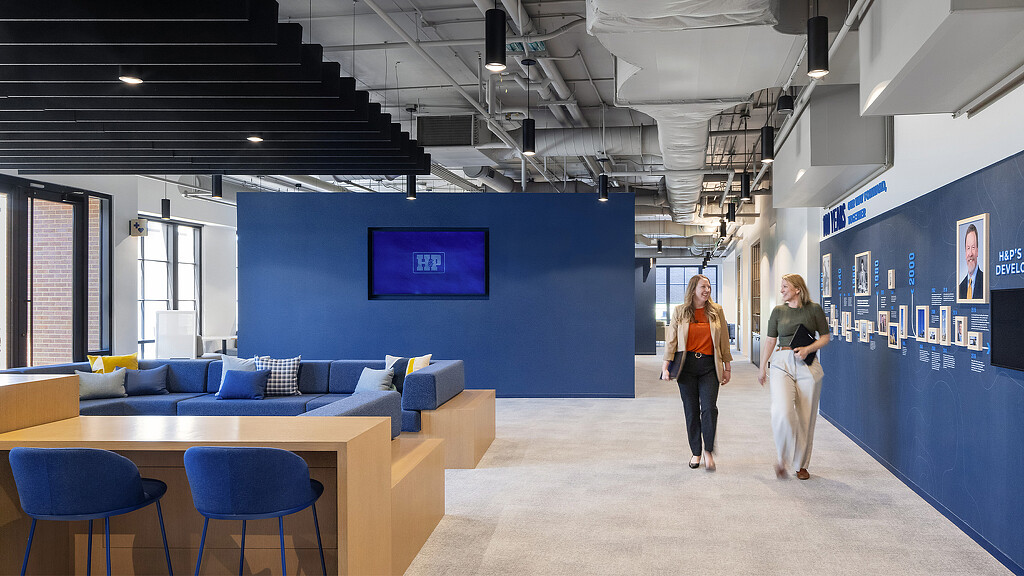 A couple of women in a room.