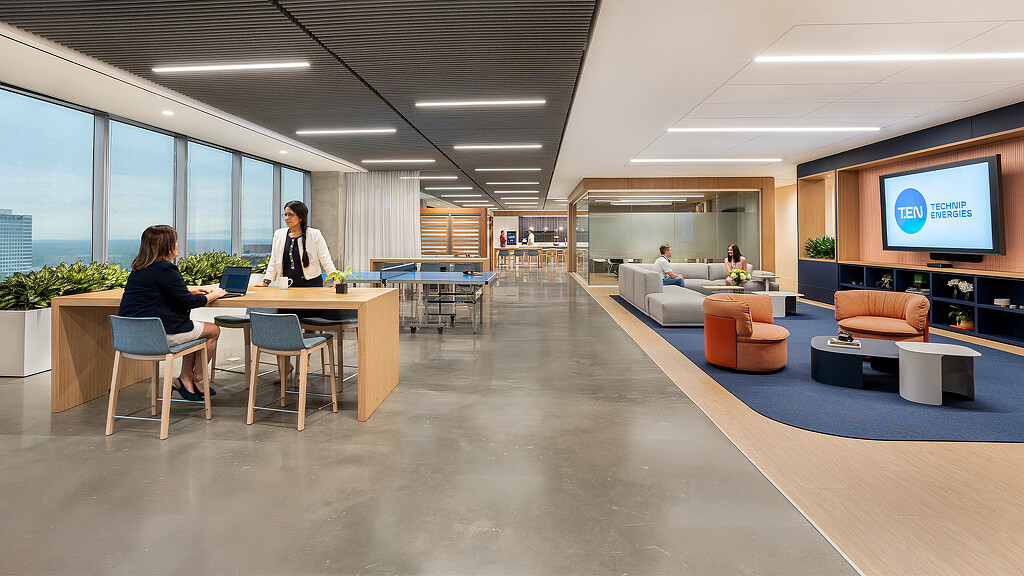 A few people in an office.