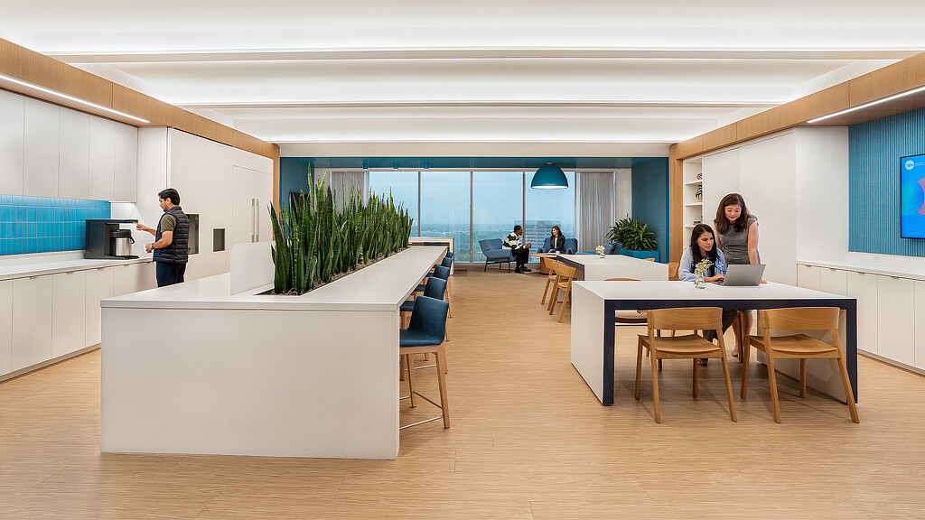 A group of people in a room.