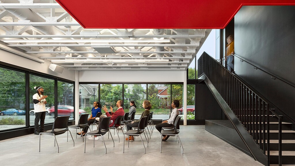 A group of people sitting at a table.