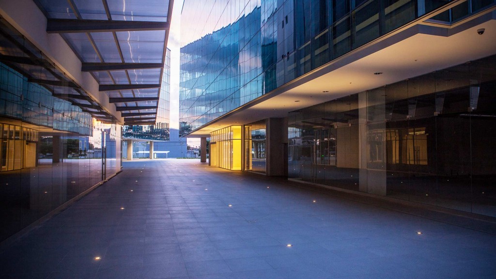 A walkway with glass walls.