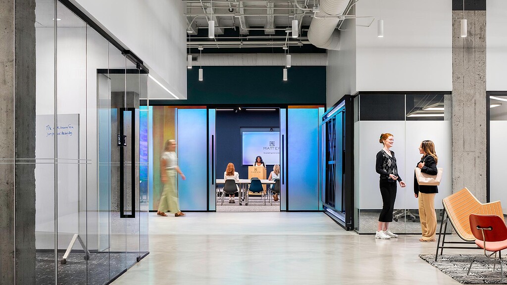 A group of people in a room.