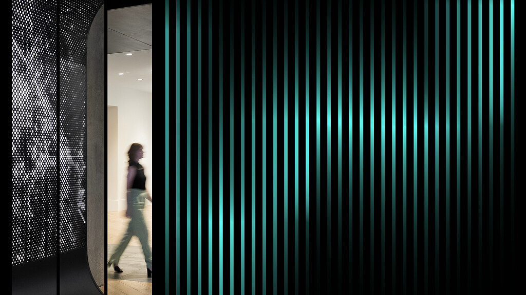 A person walking in a hallway.