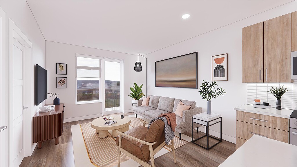 A living room with a couch and chairs.