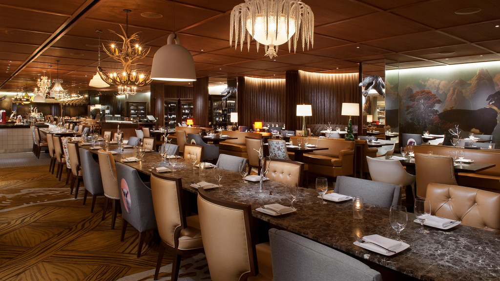 A room with tables and chairs.