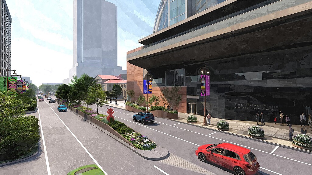 A street with cars and buildings.