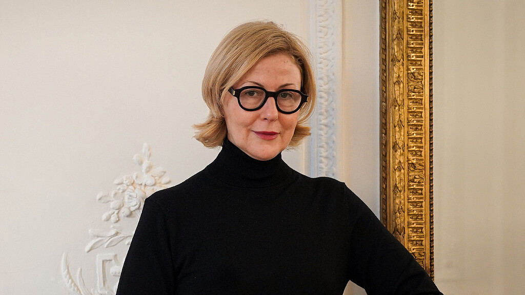 A person wearing glasses.