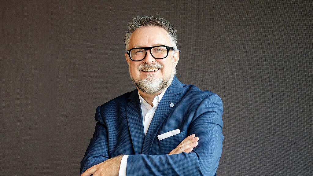A man wearing glasses.