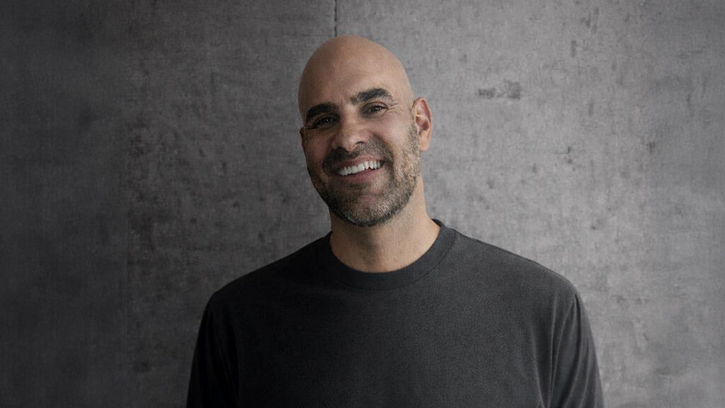 A man smiling for the camera.