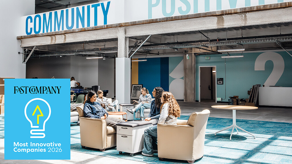 A group of people sitting in a room.