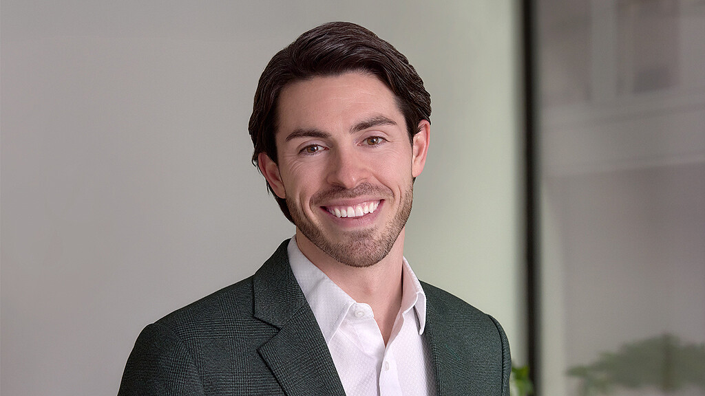 A man smiling for the camera.