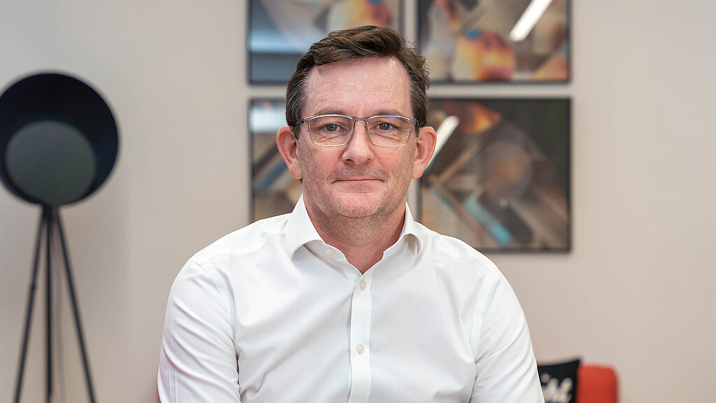 A man wearing glasses.