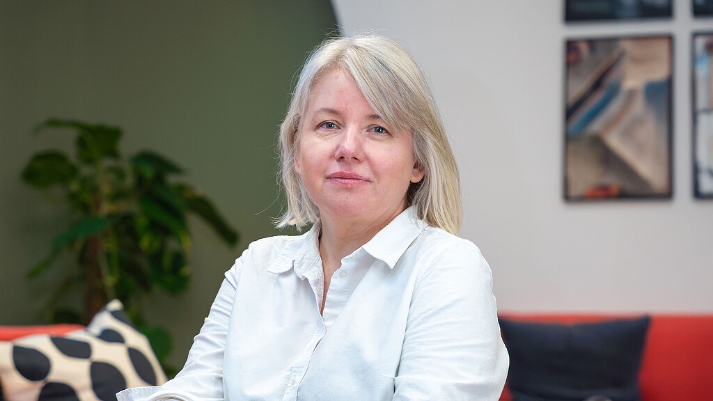 A person in a white shirt.