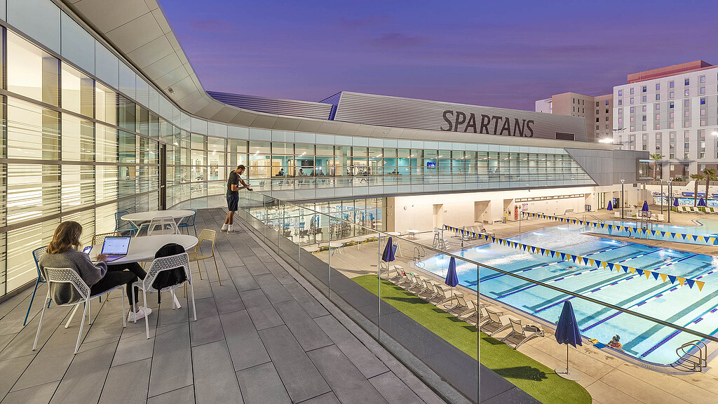 A pool with people in it.