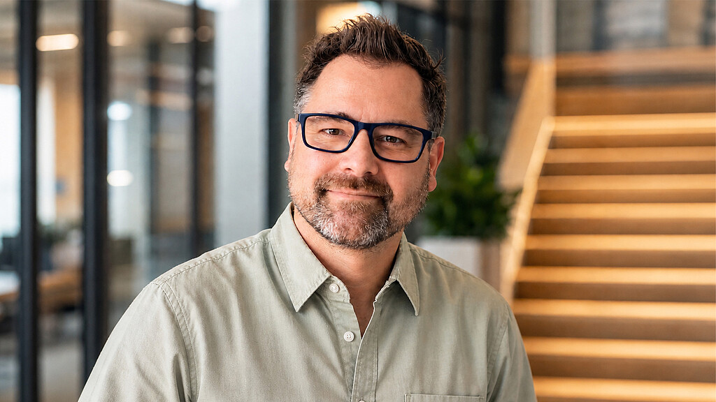 A man wearing glasses.